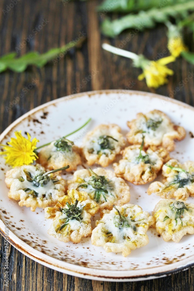 dandelion flowers fried in deep fried. Recipes from dandelion. organic healthy food. spring recipe. dishes from the first green. dandelion flowers fried in deep fried. Recipes from dandelion. organic healthy food. spring recipe. dishes from the first green.