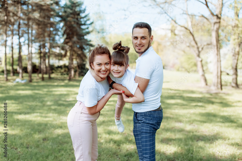 Fototapeta premium Happy family outdoors. Girl, mother.