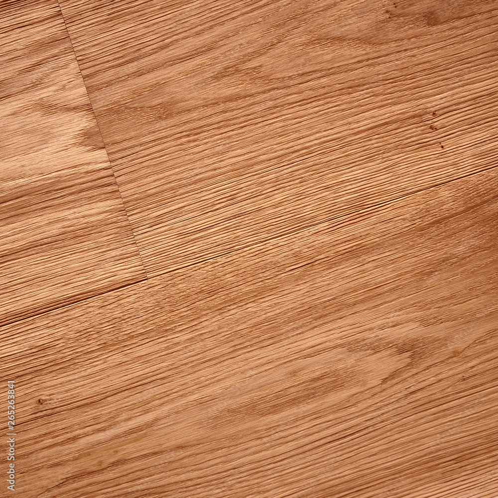 Fine natural solid valuable species of wood laminate parquet floor texture background. Wooden boards painted with natural oil, wax or mastic. Fine natural solid valuable species of wood laminate parquet floor texture background. Wooden boards painted with natural oil, wax or mastic.