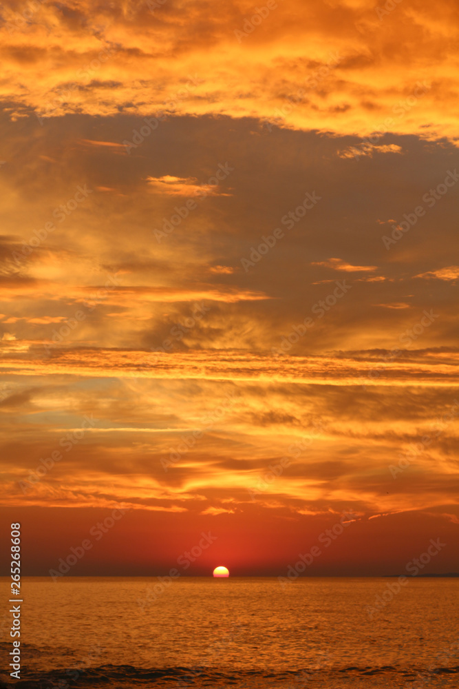 Orange sky over the sea at sunset