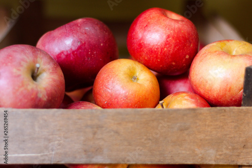Fresh red apples in a box