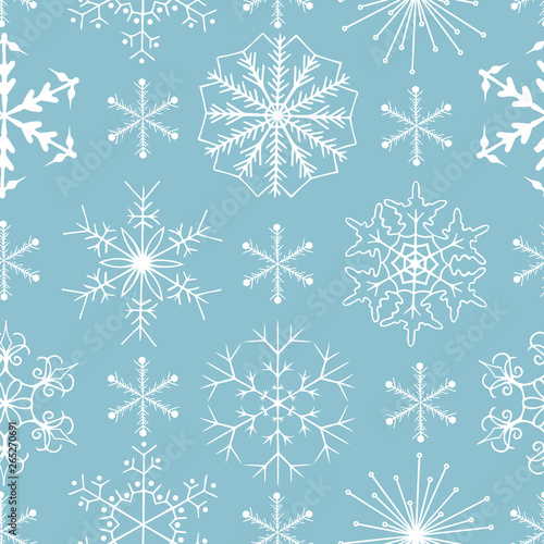 Hand drawn winter snowflakes seamless pattern. Vector Christmas gift wrapper background. 