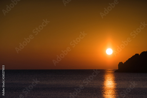 Sunset or sunrise over sea surface © Voyagerix