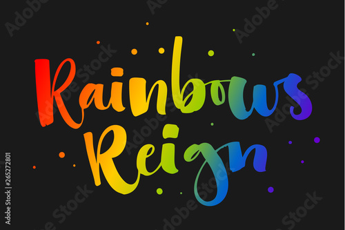 Rainbows Reign. Gay Pride rainbow colors modern calligraphy text quote on dark background background