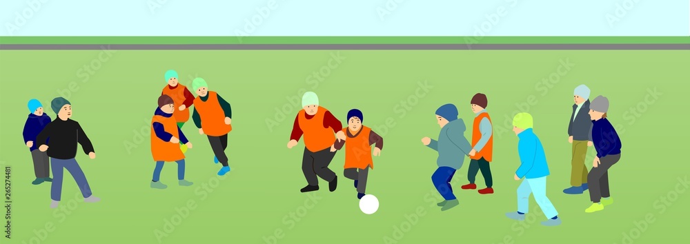 Fototapeta premium Children play football outdoors. The boys are kicking the ball.