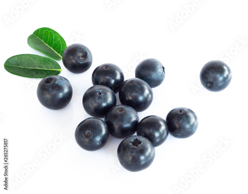 Fresh blueberries with green leaves isolated on white background