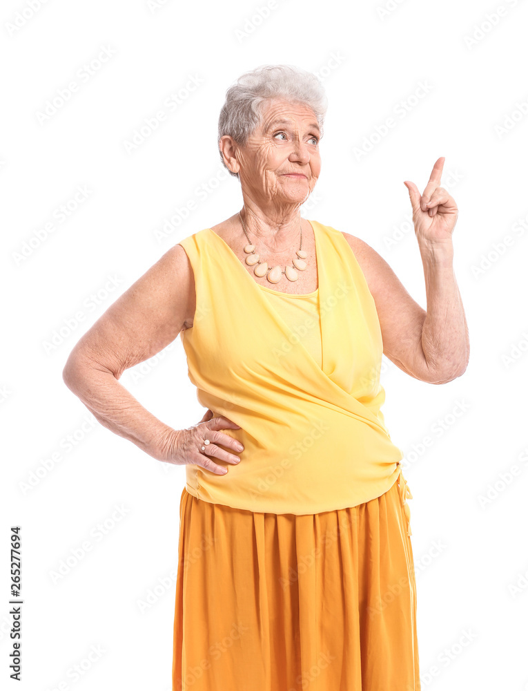Portrait of senior woman with raised index finger on white background Portrait of senior woman with raised index finger on white background