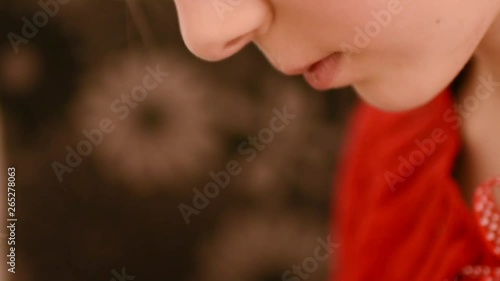Girl thinking over homework, side view