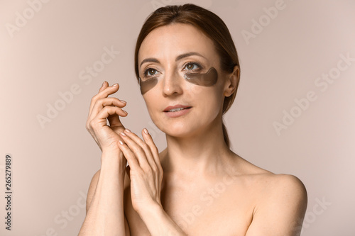 Mature woman with under-eye...