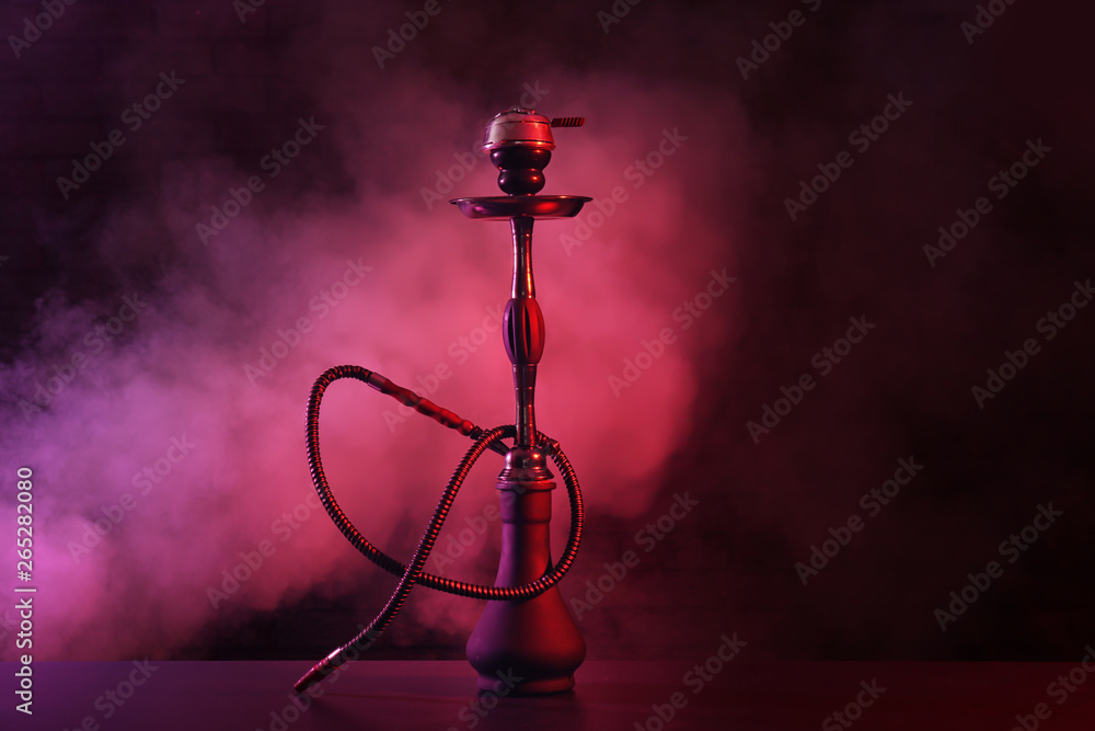 Hookah with fume on dark background Hookah with fume on dark background