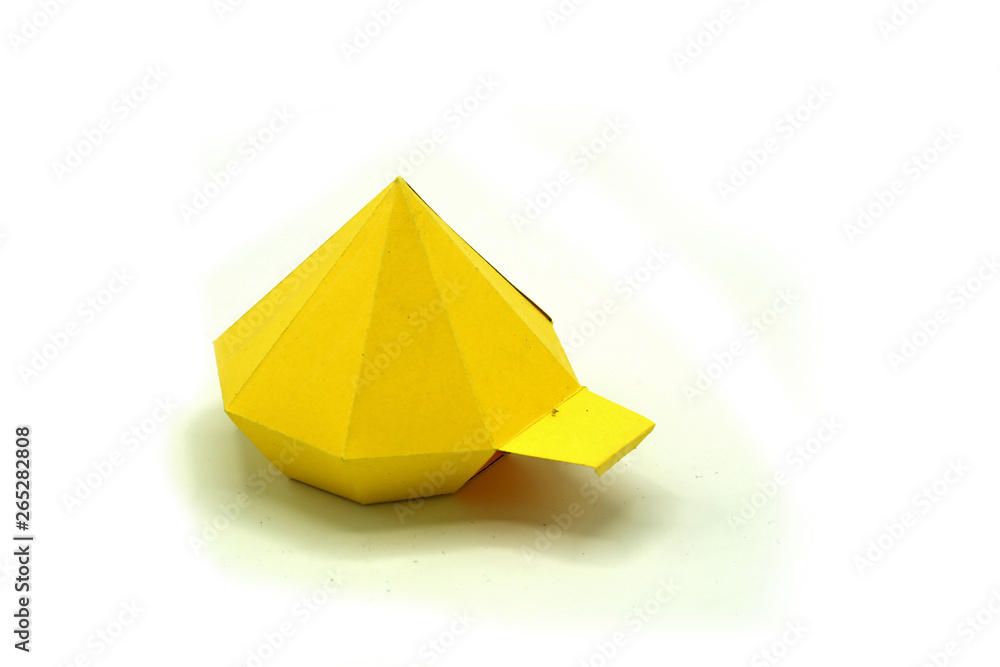 Paper duck folded from old paper isolated on white background