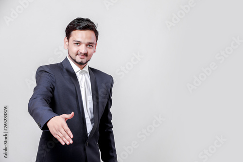 Young Indian / Asian businessman in suit