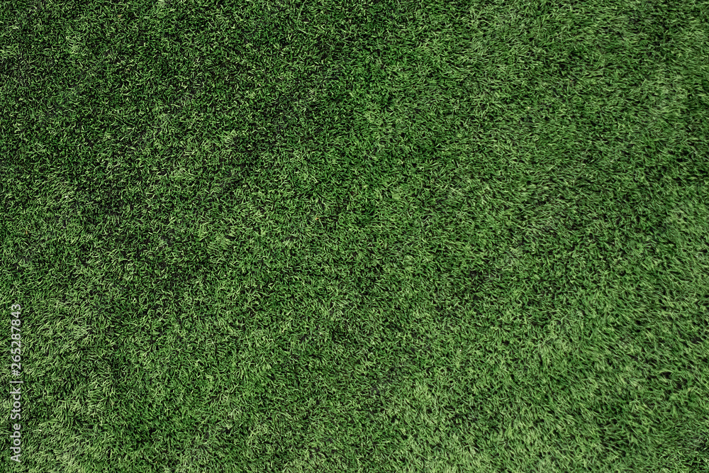 Obraz premium Top view of artificial grass, texture of green artificial lawn.