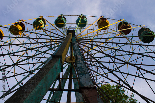 abandoned attraction farris wheel in ukrainian amusement park