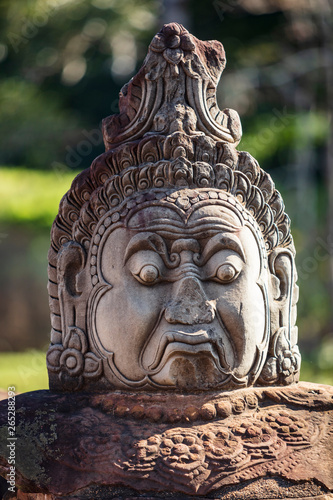 Head sculptures on the bridge leading to the south gate at Angkor Thom temple complex  Siem Reap  Cambodia