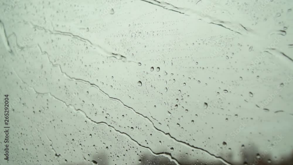 rain drops on window of train rain drops on window of train