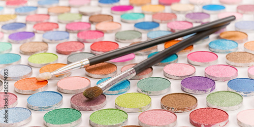 Two cosmetic brushes laying...