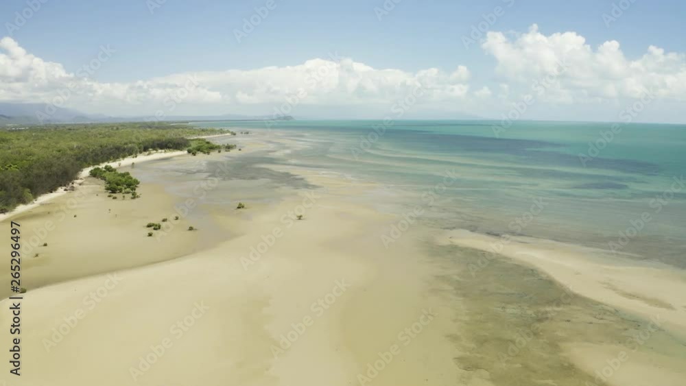Aerial, low tide and huge sand ocean bed and mangroves growing in Queensland Australia Aerial, low tide and huge sand ocean bed and mangroves growing in Queensland Australia
