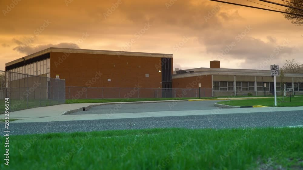 custom made wallpaper toronto digitalSunset evening school exterior establishing 4k video shot. DX elementary high education building street view lock down. Beautiful orange sky and clouds overhead.