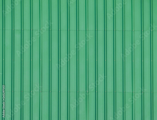 Close Up background closeup stainless steel corrugated sheet with brushed textures in green color