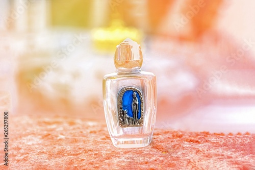 Obraz na plátně Holy water in a small bottle