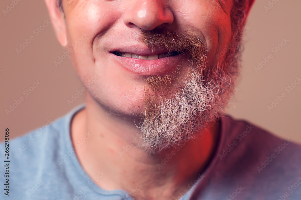 A portrait of man with half beard and hair A portrait of man with half beard and hair