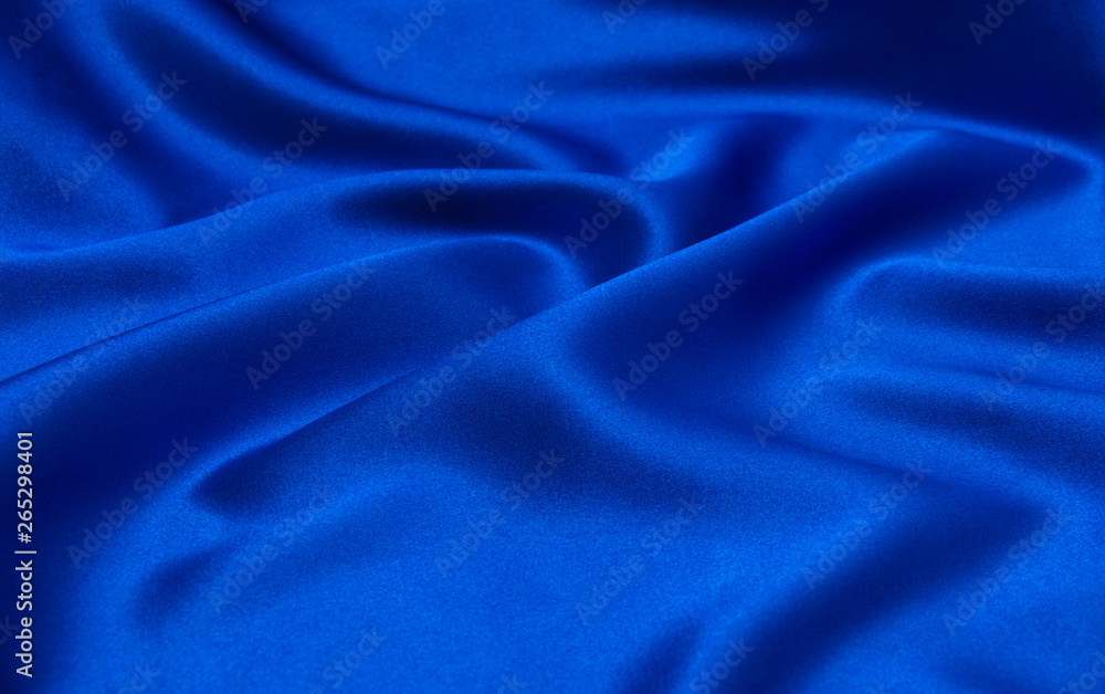 Smooth elegant blue silk can use as background Smooth elegant blue silk can use as background