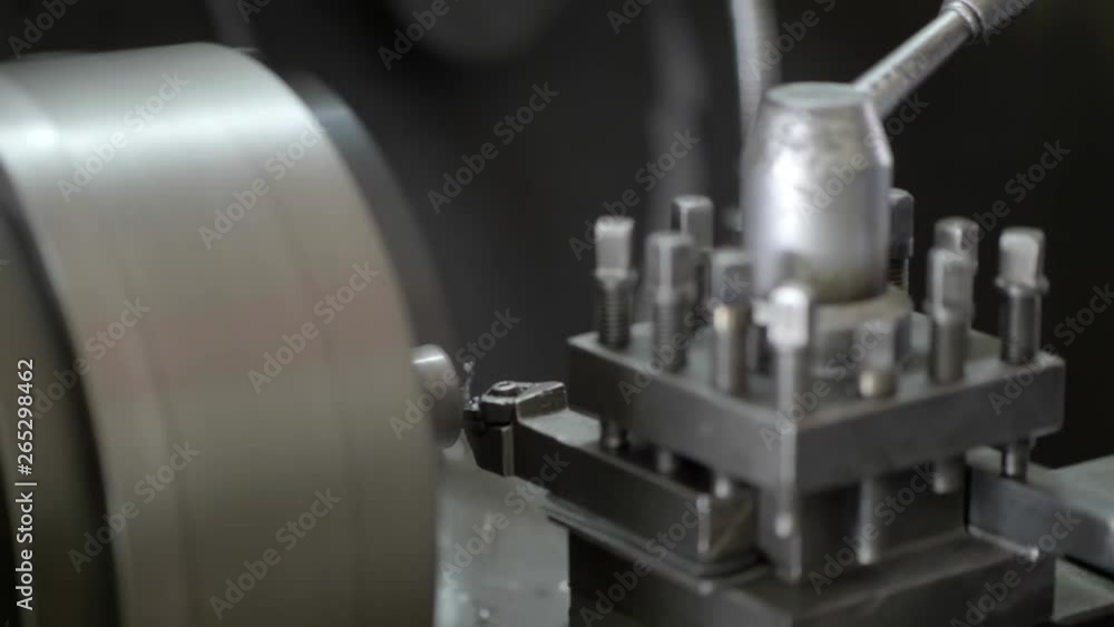 Close up of working lathe machine in the industrial factory. slow motion Close up of working lathe machine in the industrial factory. slow motion