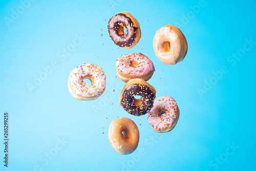 Spinkle Donuts on Colorful Background photo