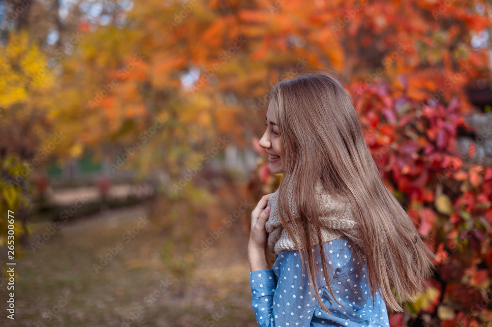 Cute beautiful smile woman walking in red autumn park Cute beautiful smile woman walking in red autumn park
