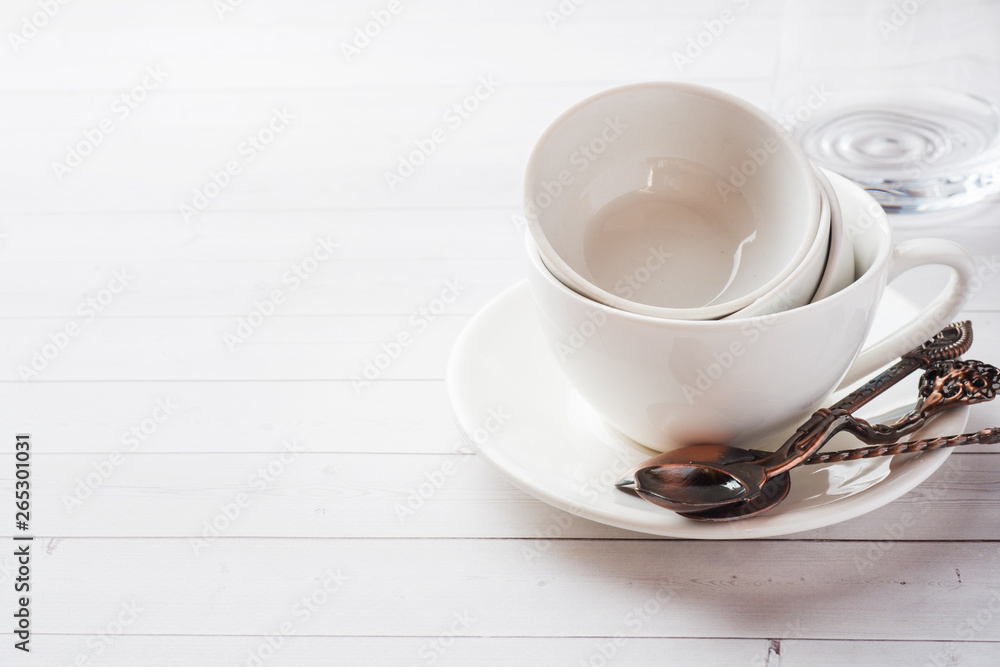 Clean dishes on table on white background. Clean dishes on table on white background.