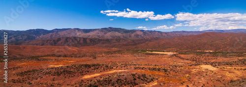 A spring Arizona landscape with white clouds and bright blue skies