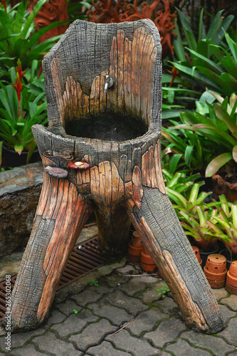 Natural wooden gutter tree fountain