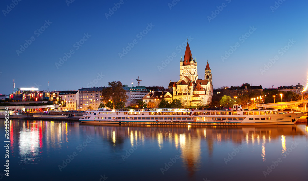 Saint Francis of Assisi Church on Danube in Vienna, Austria at night
