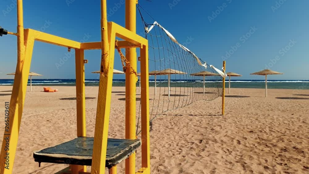 4k video of volleyball field on sea beach with golden sand at bright sunny day 4k video of volleyball field on sea beach with golden sand at bright sunny day