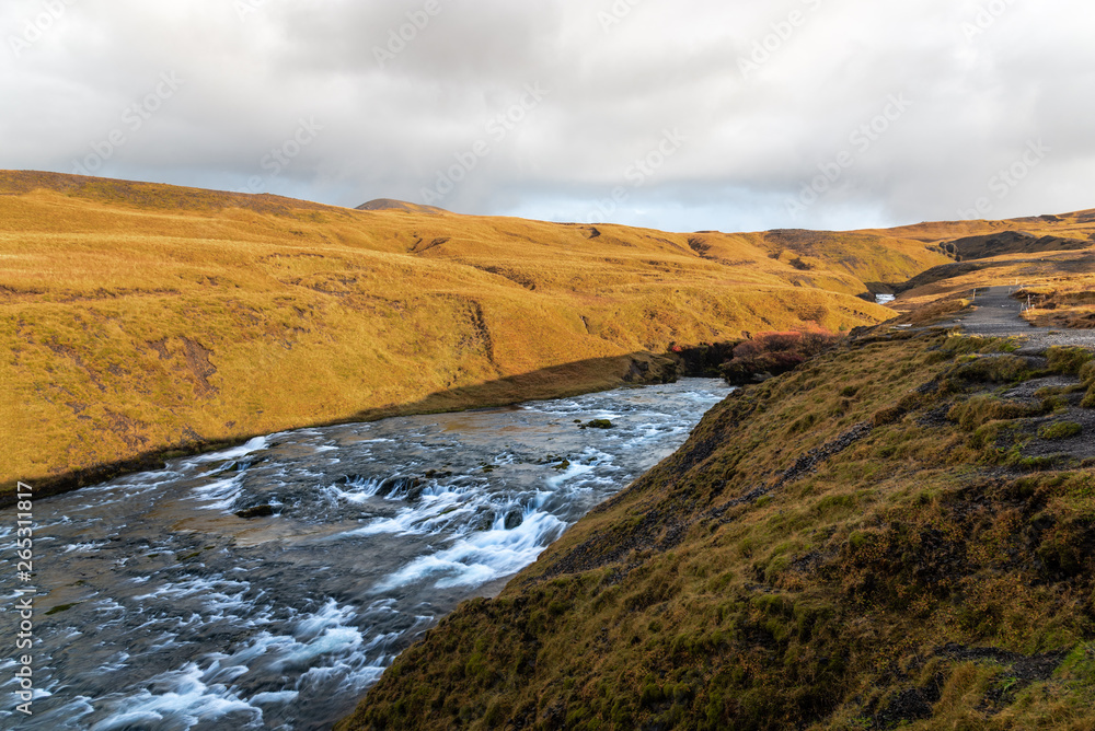 Rapids along a Mountain River in Iceland on a Sunny Autumn Day