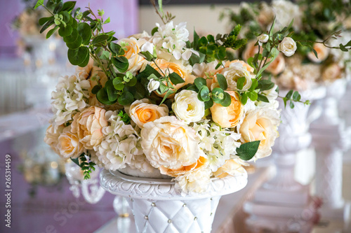 A weding arrangement with beautifoul colorful flowers. photo
