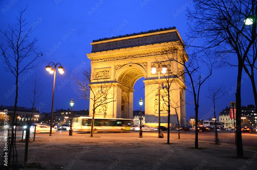 Arc de Triomphe and Champs-Elysees at night during winter in Paris, France