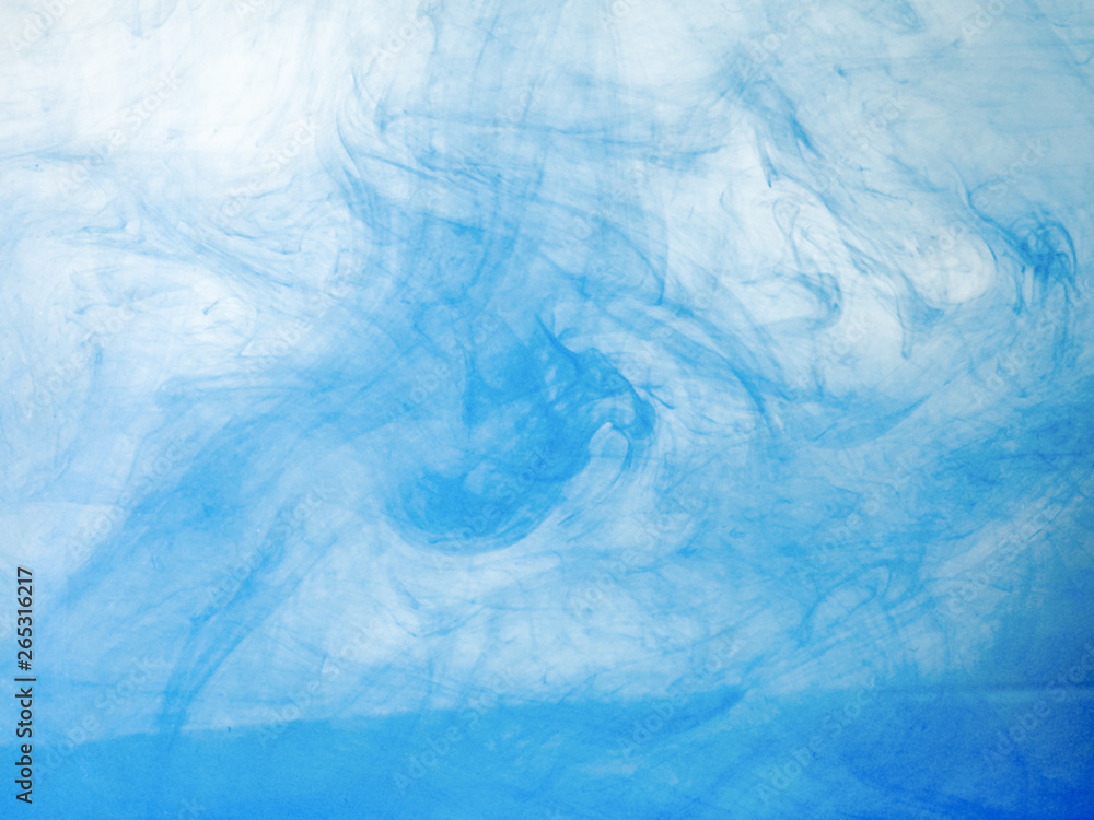 Blue acrylic ink dissolving into water, close up view. Blurred background. Acrylic light clouds moving in liquid, abstract background. Blue paint mixing with water, abstract pattern Blue acrylic ink dissolving into water, close up view. Blurred background. Acrylic light clouds moving in liquid, abstract background. Blue paint mixing with water, abstract pattern
