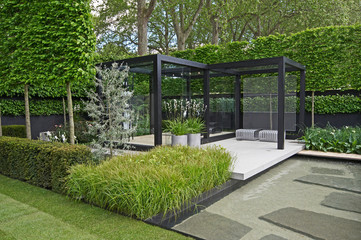 Keuken achterwand Tuin Moderne Scandinavische tuin met waterpartij  © Garden Guru