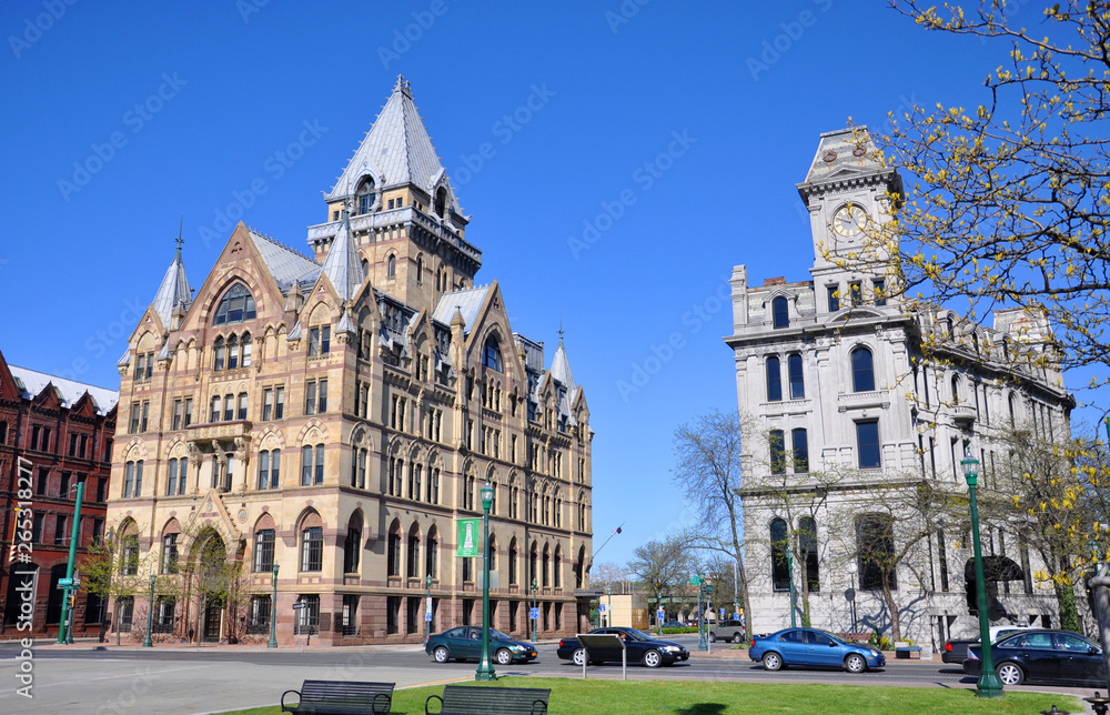 Syracuse savings Bank Building (left) and Gridley Building (right) at Clinton Square in downtown Syracuse, New York State, USA. Syracuse Savings Bank Building was built in 1876 with Gothic style.