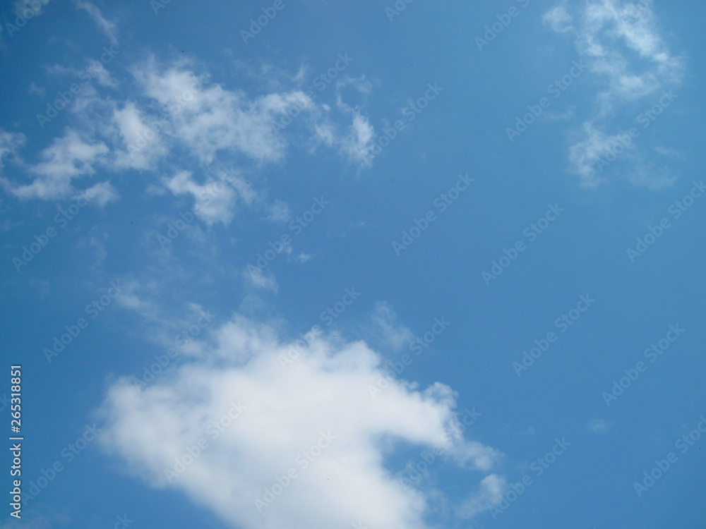 Blue sky with white clouds. Clear day time view background Blue sky with white clouds. Clear day time view background