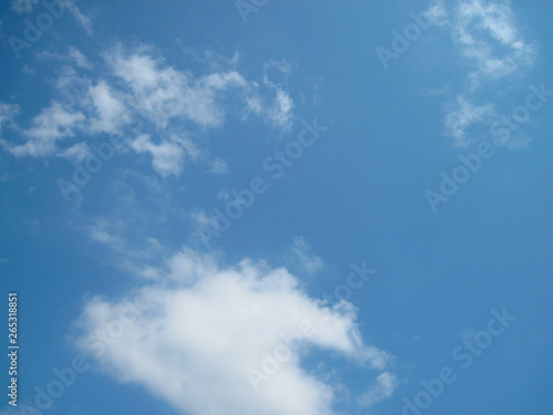 Blue sky with white clouds. Clear day time view background