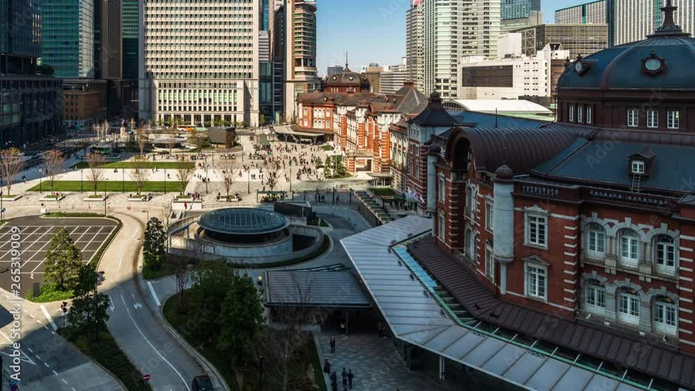 time lapse of Tokyo station, a railway station in the Marunouchi business district in Tokyo, Japan time lapse of Tokyo station, a railway station in the Marunouchi business district in Tokyo, Japan