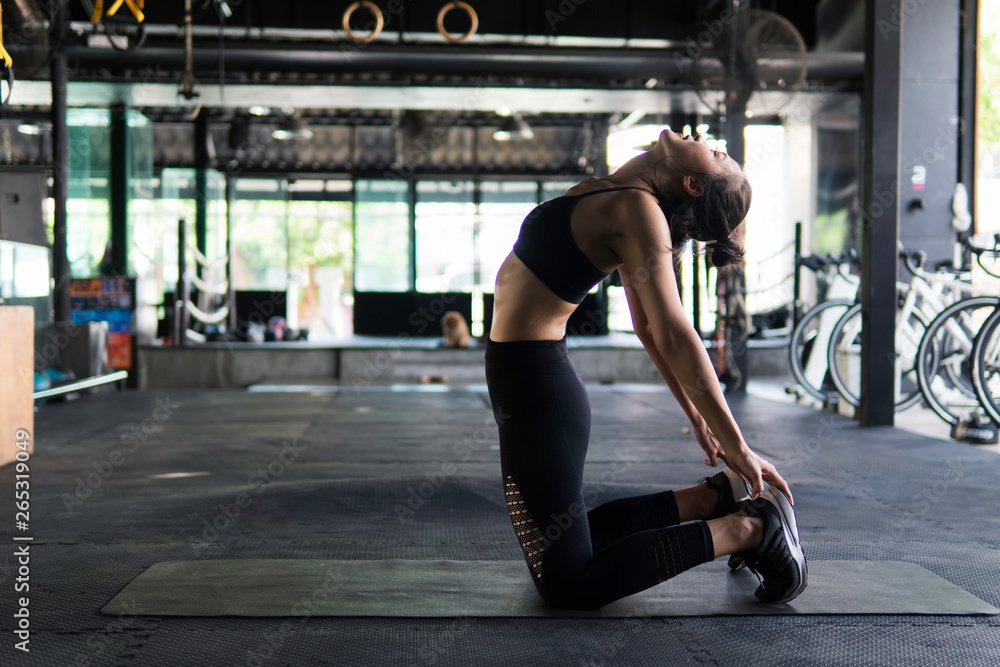 Asian women are exercising in a yoga practice gym.. Asian women are exercising in a yoga practice gym..
