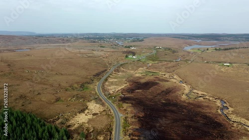 Aerial view of Road to Dungloe at Loch Mhin Leic na Leabhar - Meenlecknalore Lough - close to Dungloe in County Donegal, Ireland photo