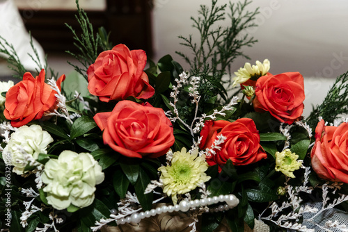 beautiful rich bouquet of red roses at wedding ceremony, gift concept