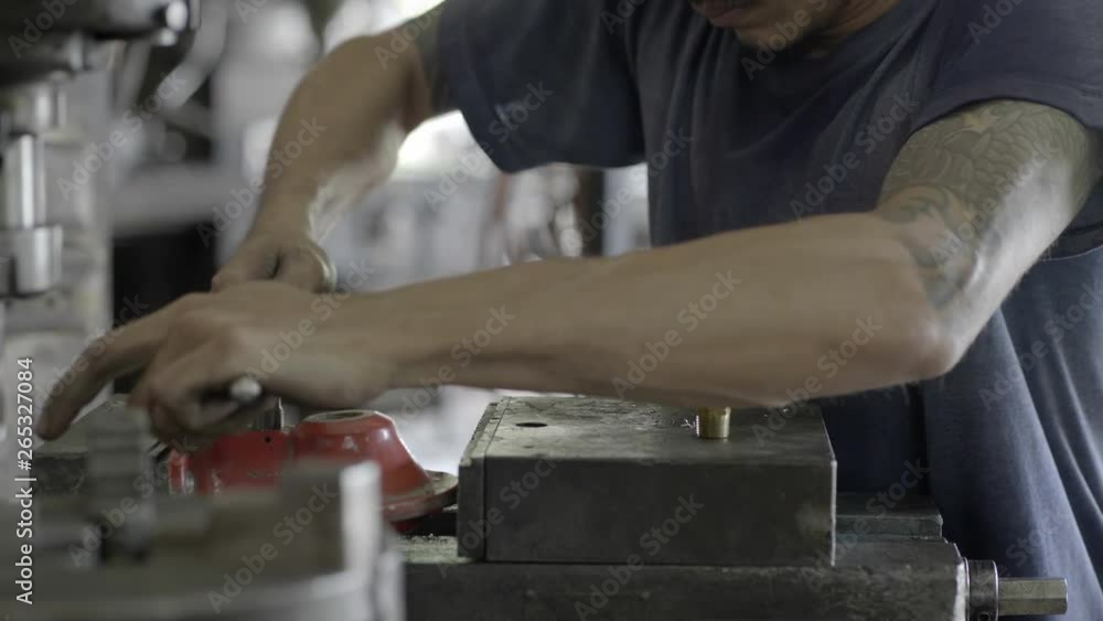Workers are working Screw new bolts with hand Workers are working Screw new bolts with hand