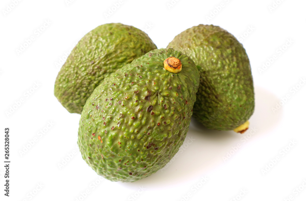Obraz premium Three Fresh Ripe Avocado Whole Fruits Isolated on White Background