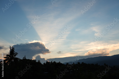 Cloudscape at dawn sunrise sun rays